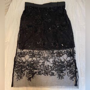Zara Woman black sequin midi skirt with sheer overlay. Below knee on 5’3 frame.